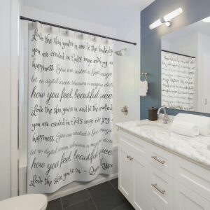 Shower curtain featuring inspiring words from Queen Majeeda's poem.